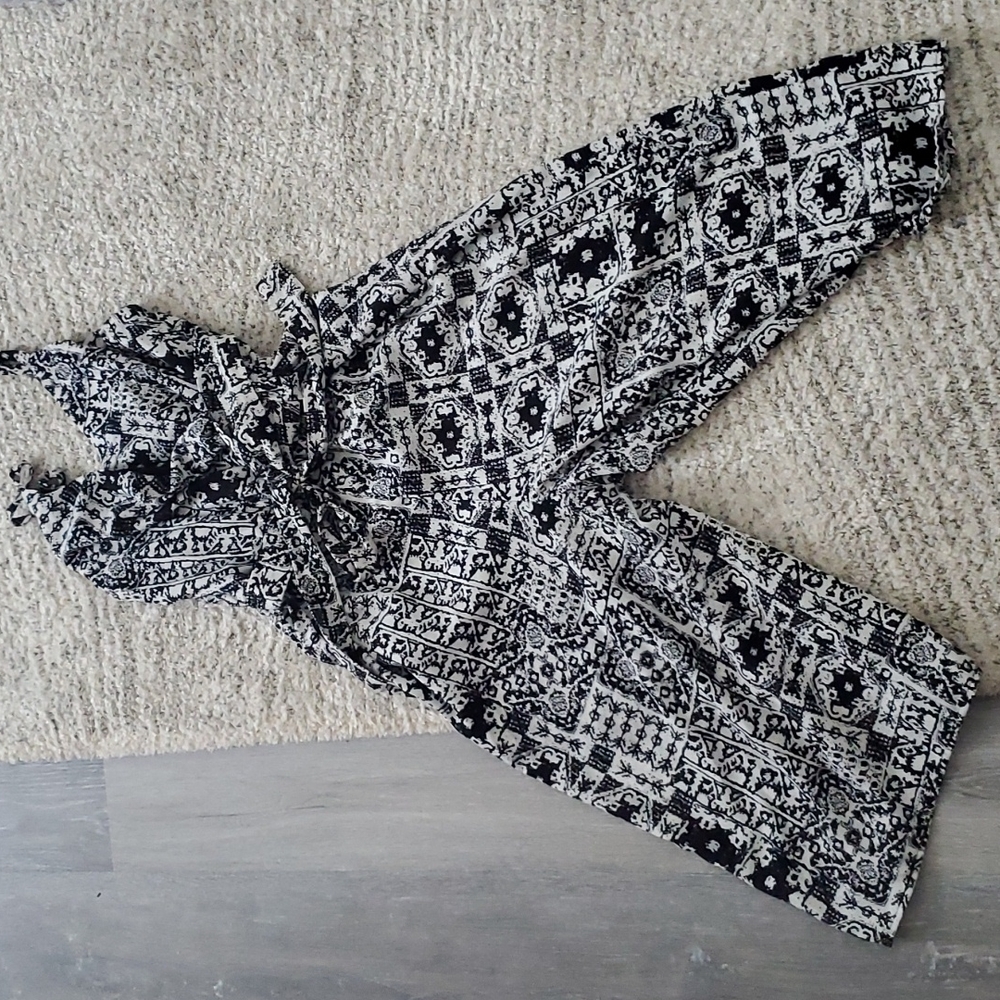 Patterned Capri onesie.... size small